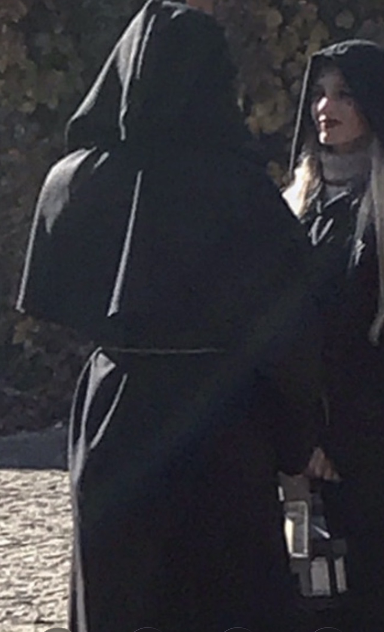 The Secret Brotherhood wearing white masks at Radomysl Castle